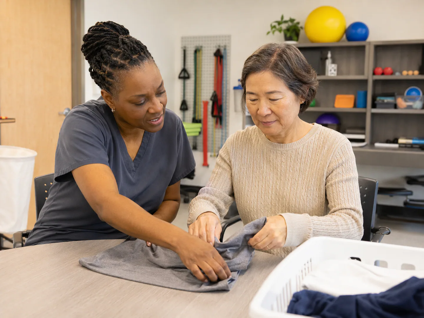 Occupational therapist guiding a practical daily activity in a professional setting